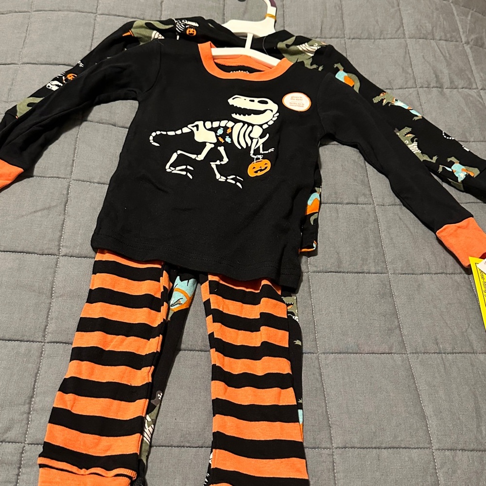 Carter's Bright Orange and Soft Gray Pajama Set for Halloween season.